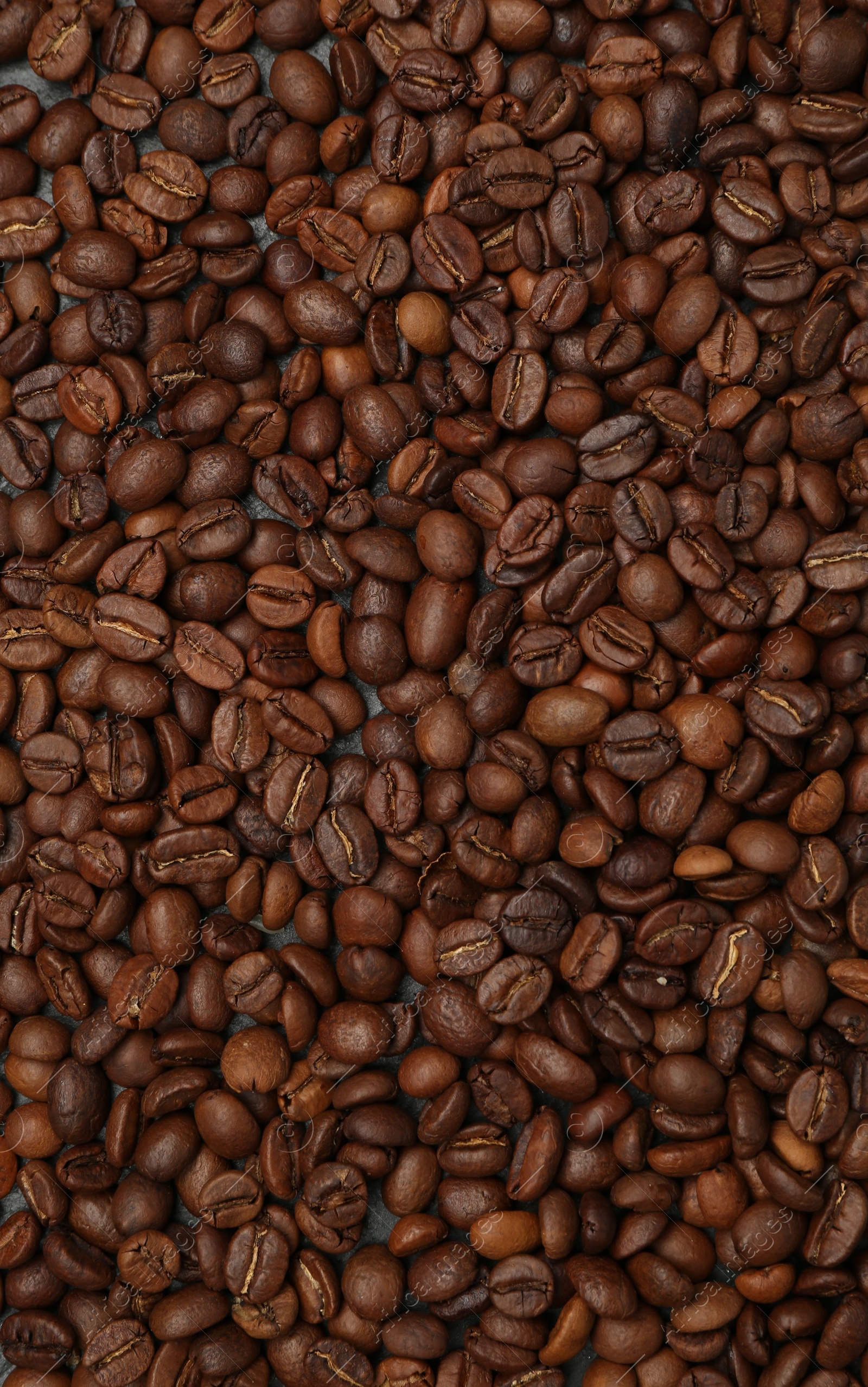 Aromatic coffee beans as background, top view Photo of Aromatic coffee beans as background, top view