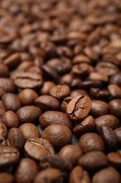 Photo of Aromatic coffee beans as background, closeup view