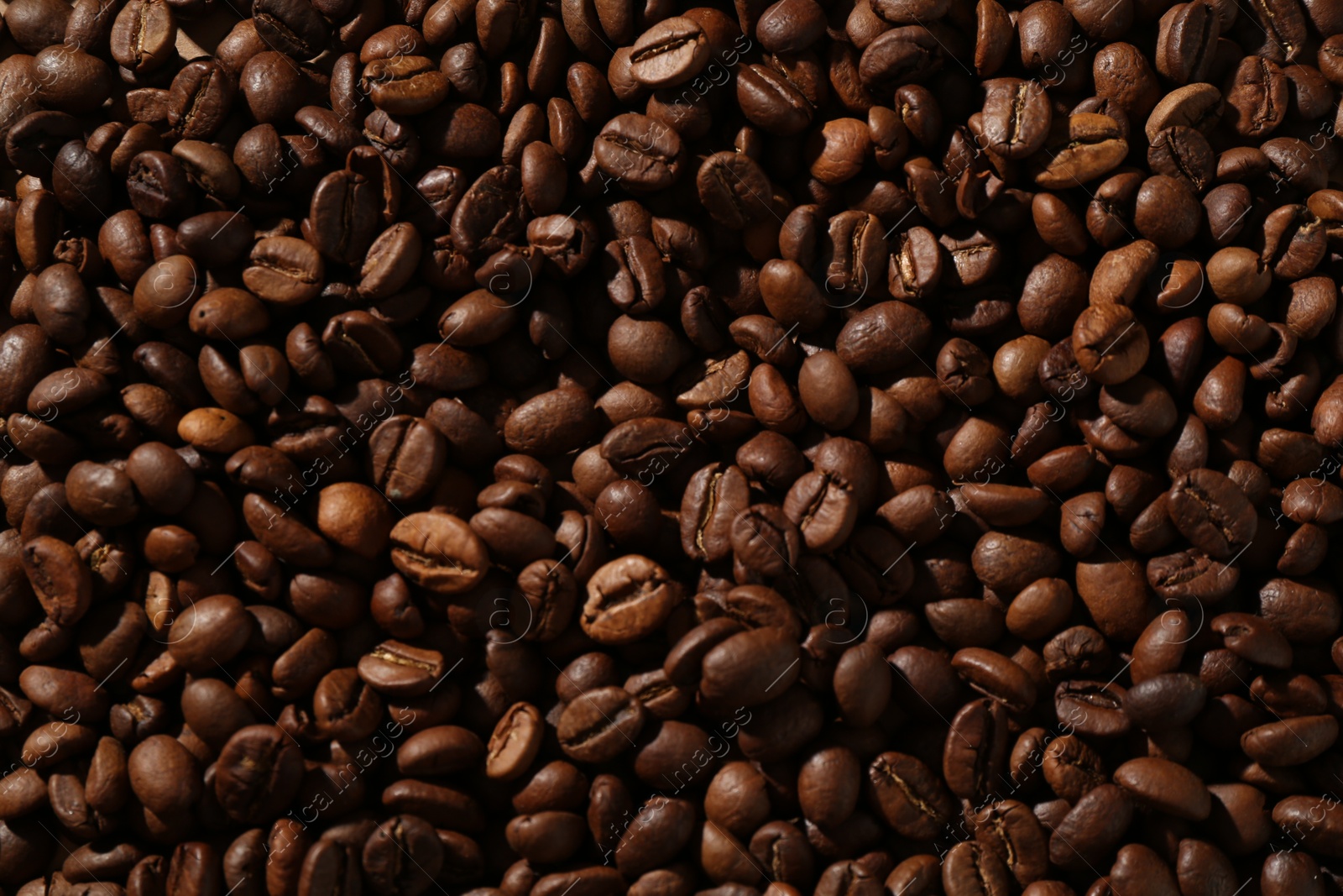 Aromatic coffee beans as background, top view Photo of Aromatic coffee beans as background, top view