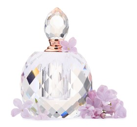 Photo of Luxury perfume and beautiful lilac flowers isolated on white