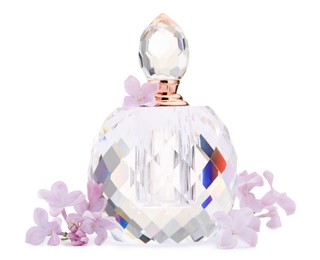 Photo of Luxury perfume and beautiful lilac flowers isolated on white
