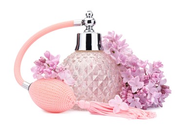 Photo of Luxury perfume and beautiful lilac flowers isolated on white