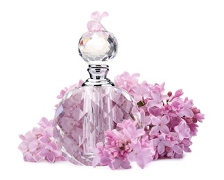 Photo of Luxury perfume and beautiful lilac flowers isolated on white