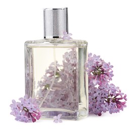 Photo of Luxury perfume and beautiful lilac flowers isolated on white