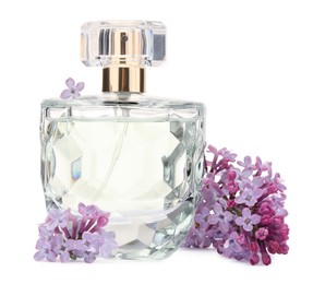 Photo of Luxury perfume and beautiful lilac flowers isolated on white