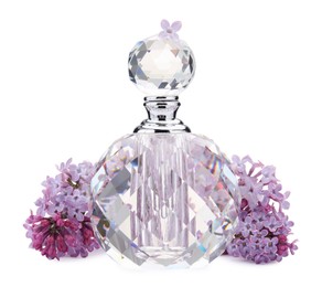 Photo of Luxury perfume and beautiful lilac flowers isolated on white