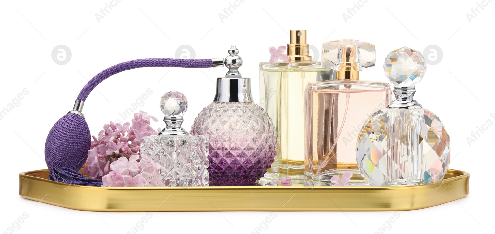 Luxury perfumes and beautiful lilac flowers isolated on white Photo of Luxury perfumes and beautiful lilac flowers isolated on white