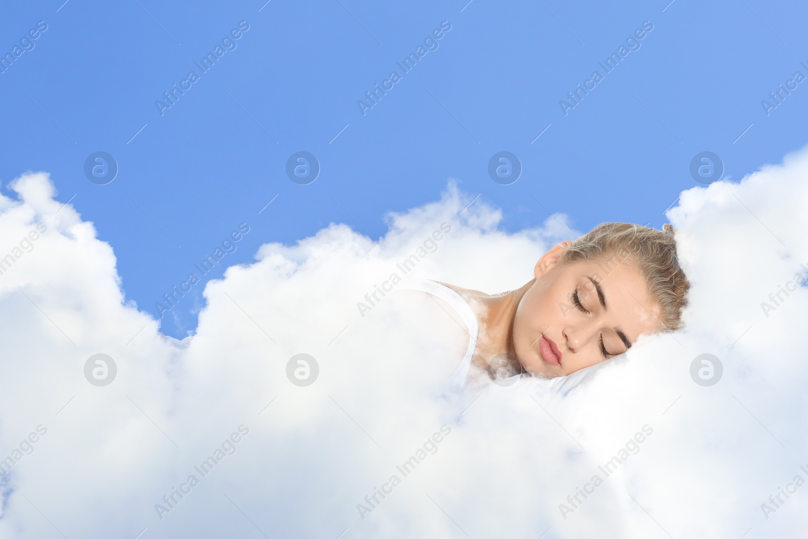 Woman sleeping on fluffy cloud in blue sky. Bedtime Image of Woman sleeping on fluffy cloud in blue sky. Bedtime