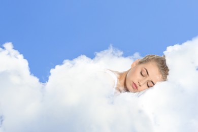 Image of Woman sleeping on fluffy cloud in blue sky. Bedtime