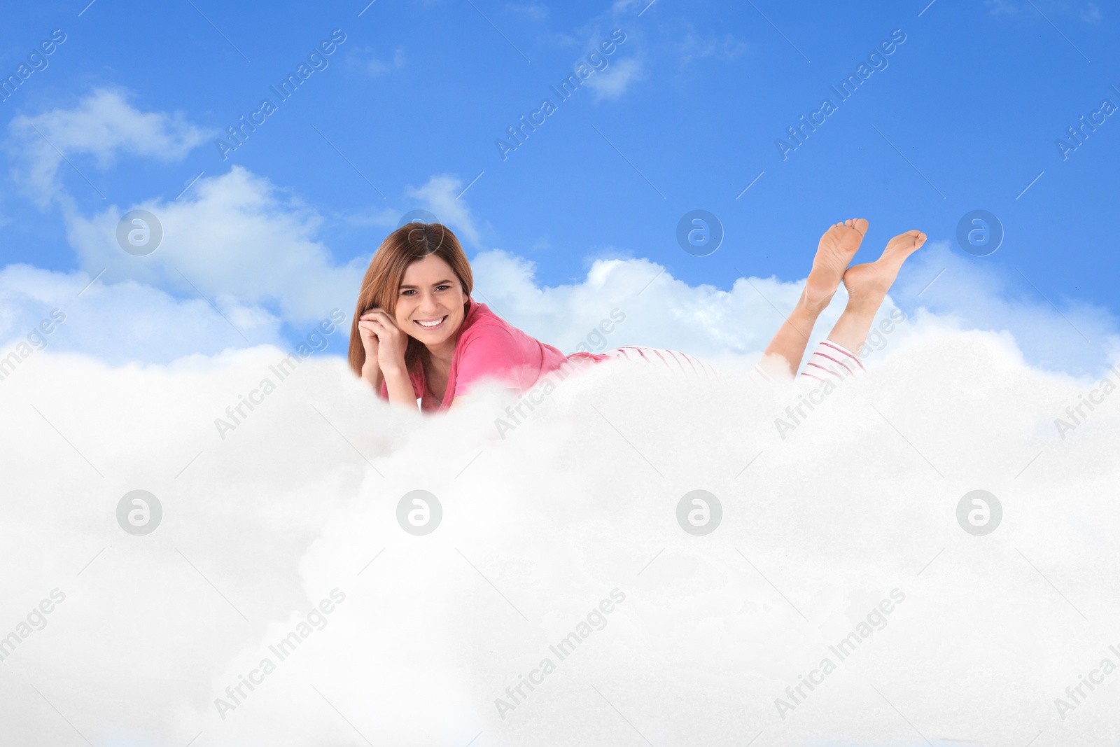 Woman lying on fluffy cloud in blue sky. Bedtime Image of Woman lying on fluffy cloud in blue sky. Bedtime