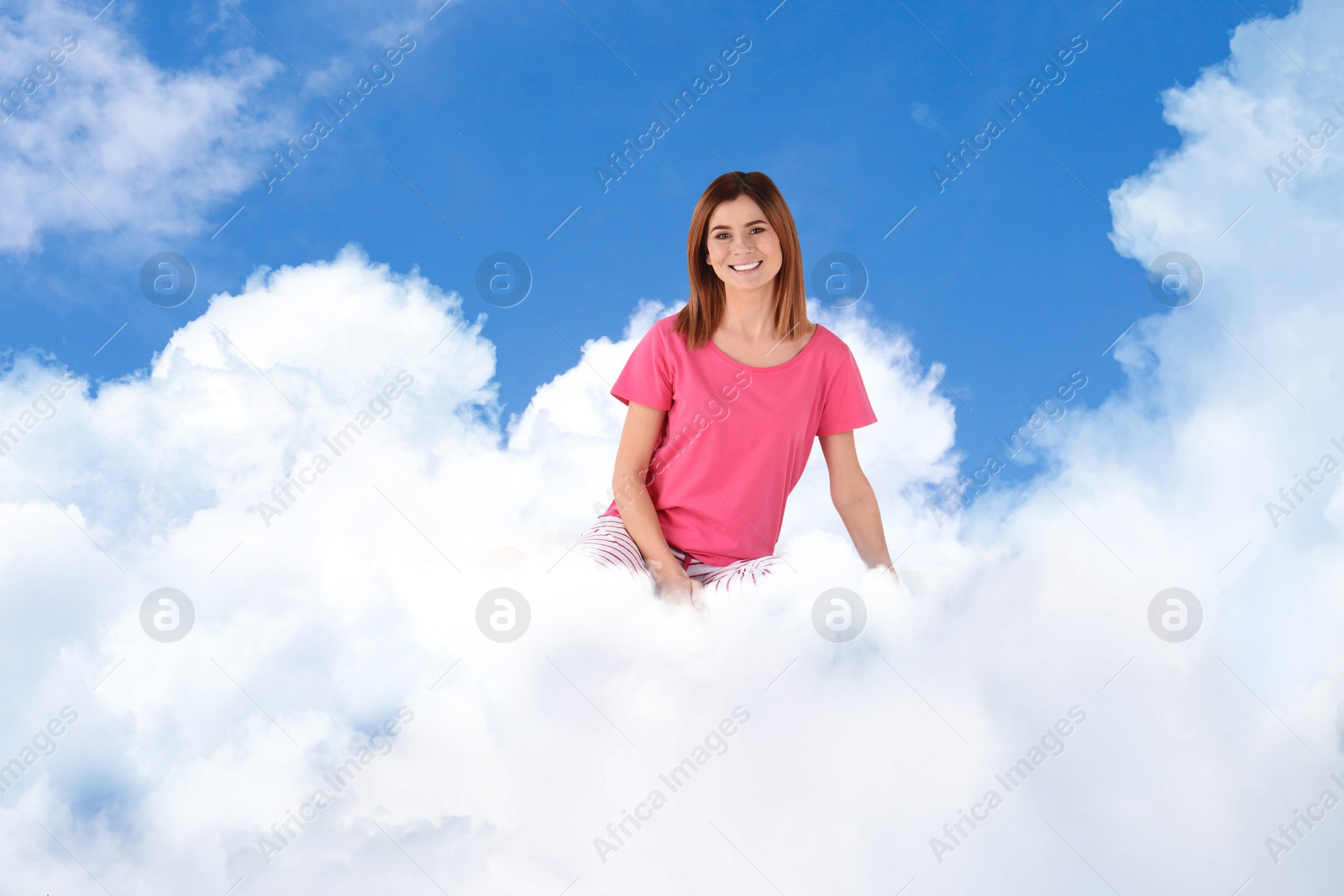 Woman sitting on fluffy cloud in blue sky. Bedtime Image of Woman sitting on fluffy cloud in blue sky. Bedtime