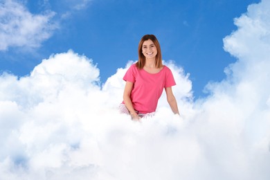 Image of Woman sitting on fluffy cloud in blue sky. Bedtime