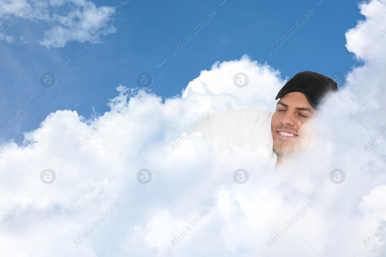 Man with blanket and mask sleeping on fluffy cloud in blue sky. Bedtime Image of Man with blanket and mask sleeping on fluffy cloud in blue sky. Bedtime