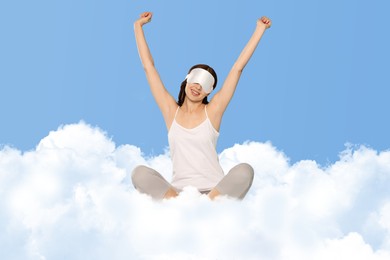 Image of Woman with sleep mask stretching on fluffy cloud in blue sky