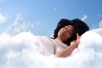 Image of Woman sleeping on fluffy cloud in blue sky. Bedtime