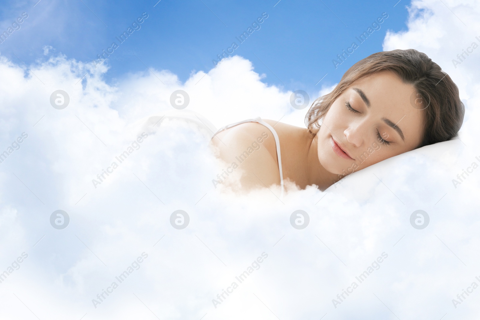 Woman sleeping on fluffy cloud in blue sky. Bedtime Image of Woman sleeping on fluffy cloud in blue sky. Bedtime
