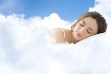 Image of Woman sleeping on fluffy cloud in blue sky. Bedtime