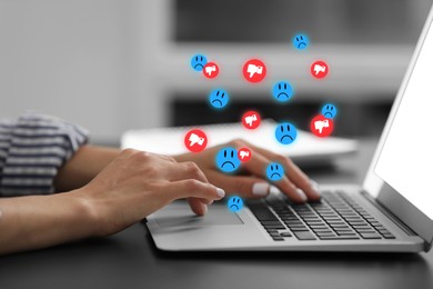 Image of Woman using laptop at table, closeup. Social media notifications flying out of computer