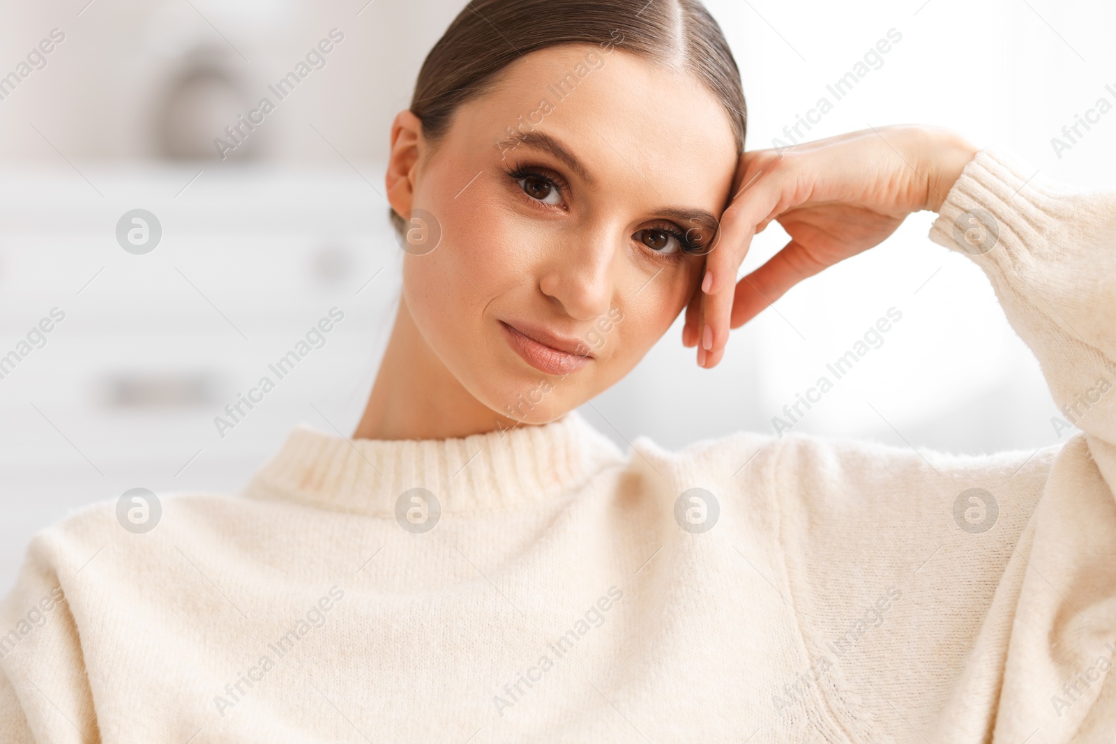 Portrait of beautiful young woman at home Photo of Portrait of beautiful young woman at home