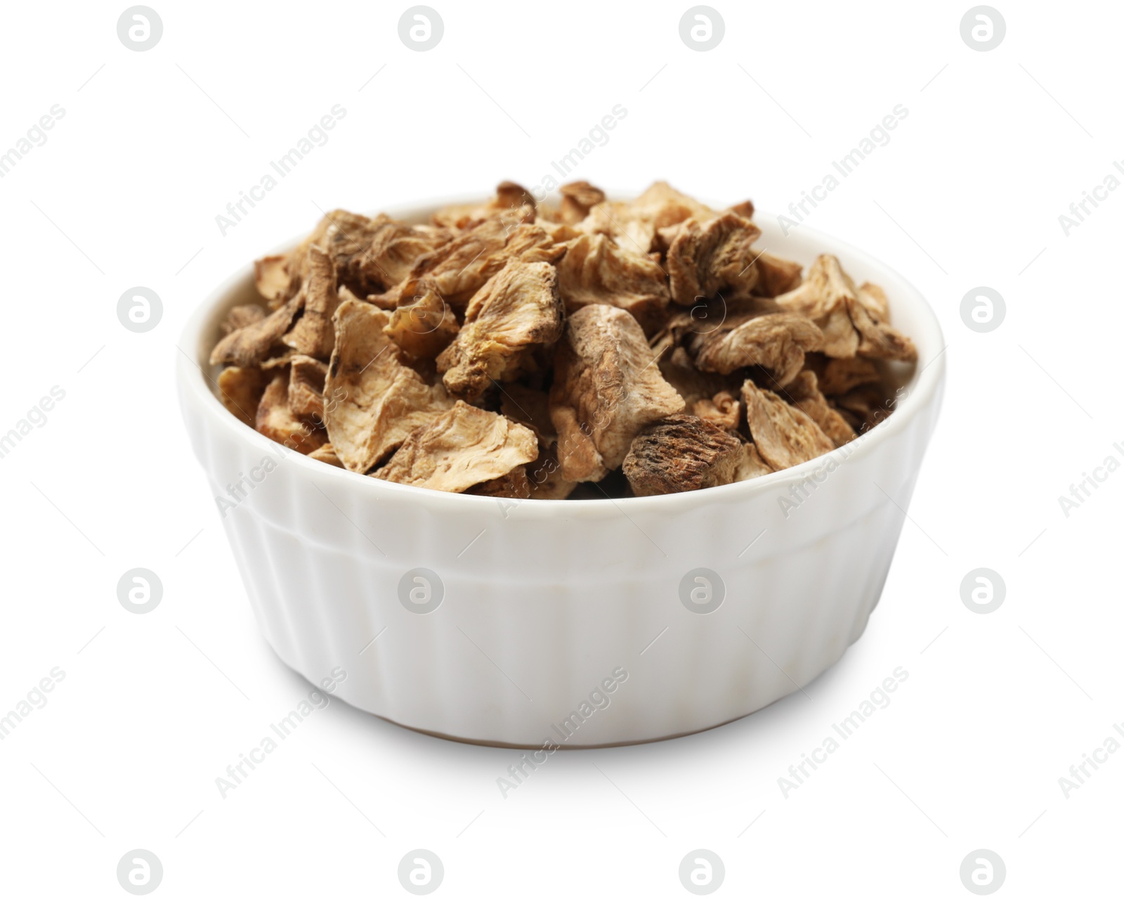 Pieces of dry chicory roots in bowl isolated on white Photo of Pieces of dry chicory roots in bowl isolated on white