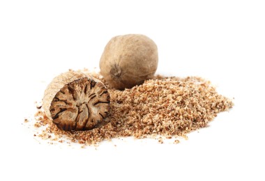 Photo of Whole, cut nutmegs and powder isolated on white