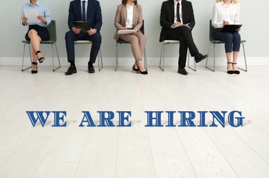 Image of We Are Hiring. People waiting for job interview in office hall, closeup. Recruitment, human resource concept
