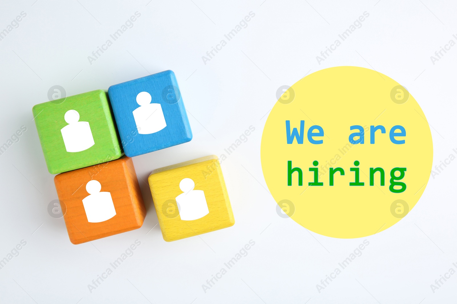 We Are Hiring. Colorful cubes with human icons on white background, top view. Recruitment, human resource concept Image of We Are Hiring. Colorful cubes with human icons on white background, top view. Recruitment, human resource concept