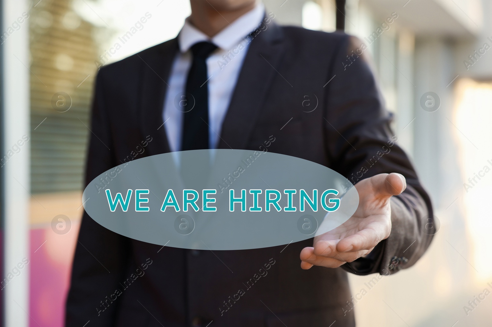 We Are Hiring. Man offering helping hand outdoors, closeup. Recruitment, human resource concept Image of We Are Hiring. Man offering helping hand outdoors, closeup. Recruitment, human resource concept