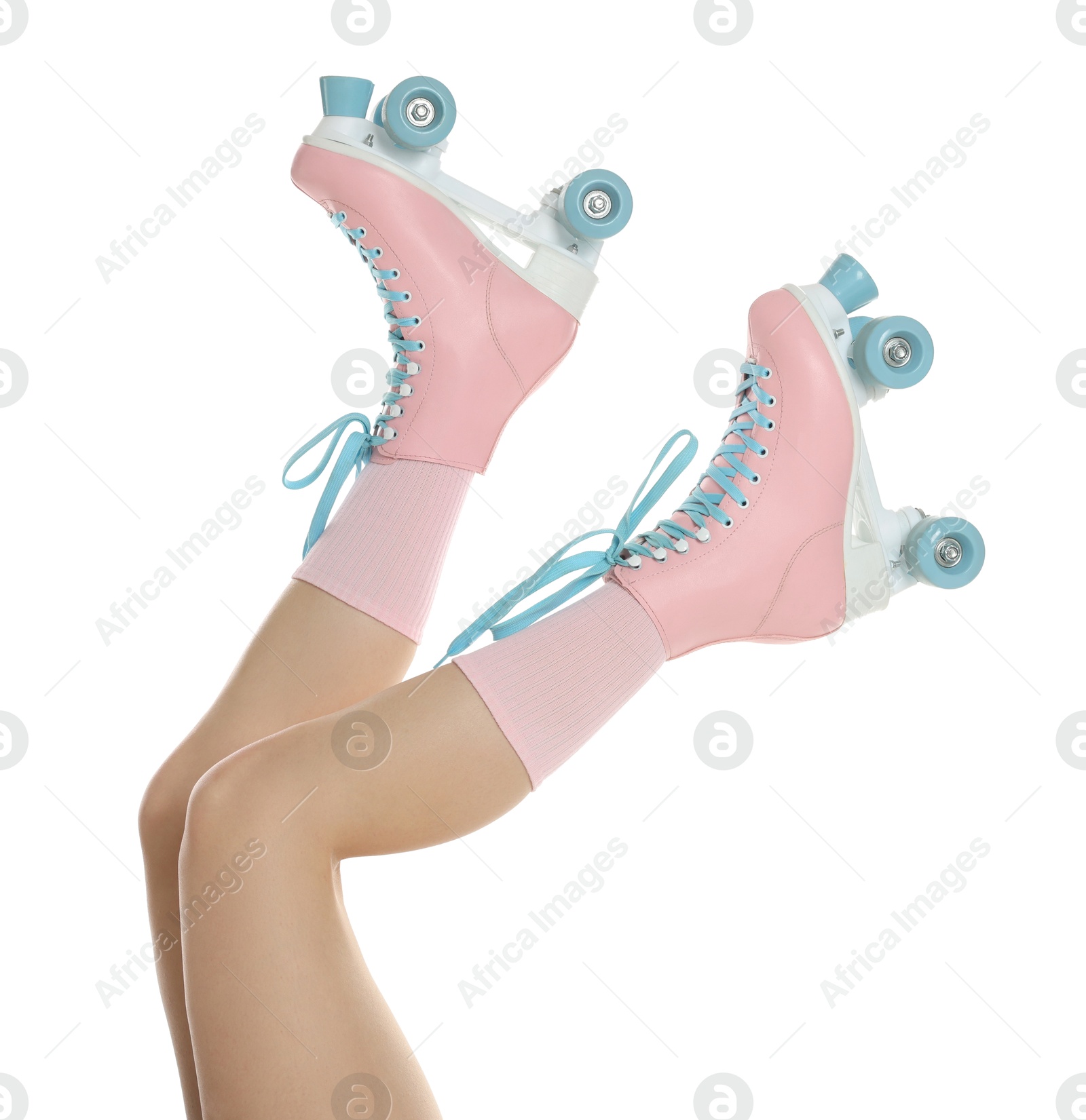 Woman in roller skates on white background, closeup Photo of Woman in roller skates on white background, closeup