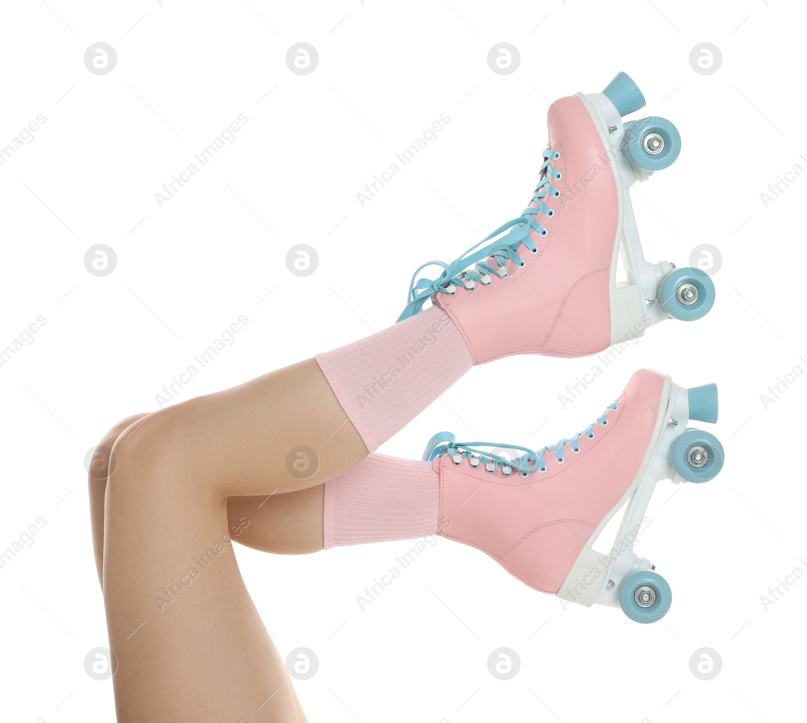 Woman in roller skates on white background, closeup Photo of Woman in roller skates on white background, closeup