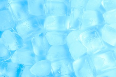 Photo of Cubes of clear ice as background, top view