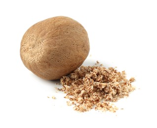 Photo of Whole nutmeg and powder isolated on white