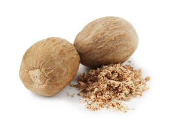 Photo of Whole nutmegs and powder isolated on white