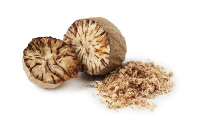 Photo of Halves of nutmeg and powder isolated on white