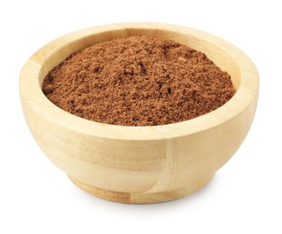 Photo of Nutmeg powder in bowl isolated on white