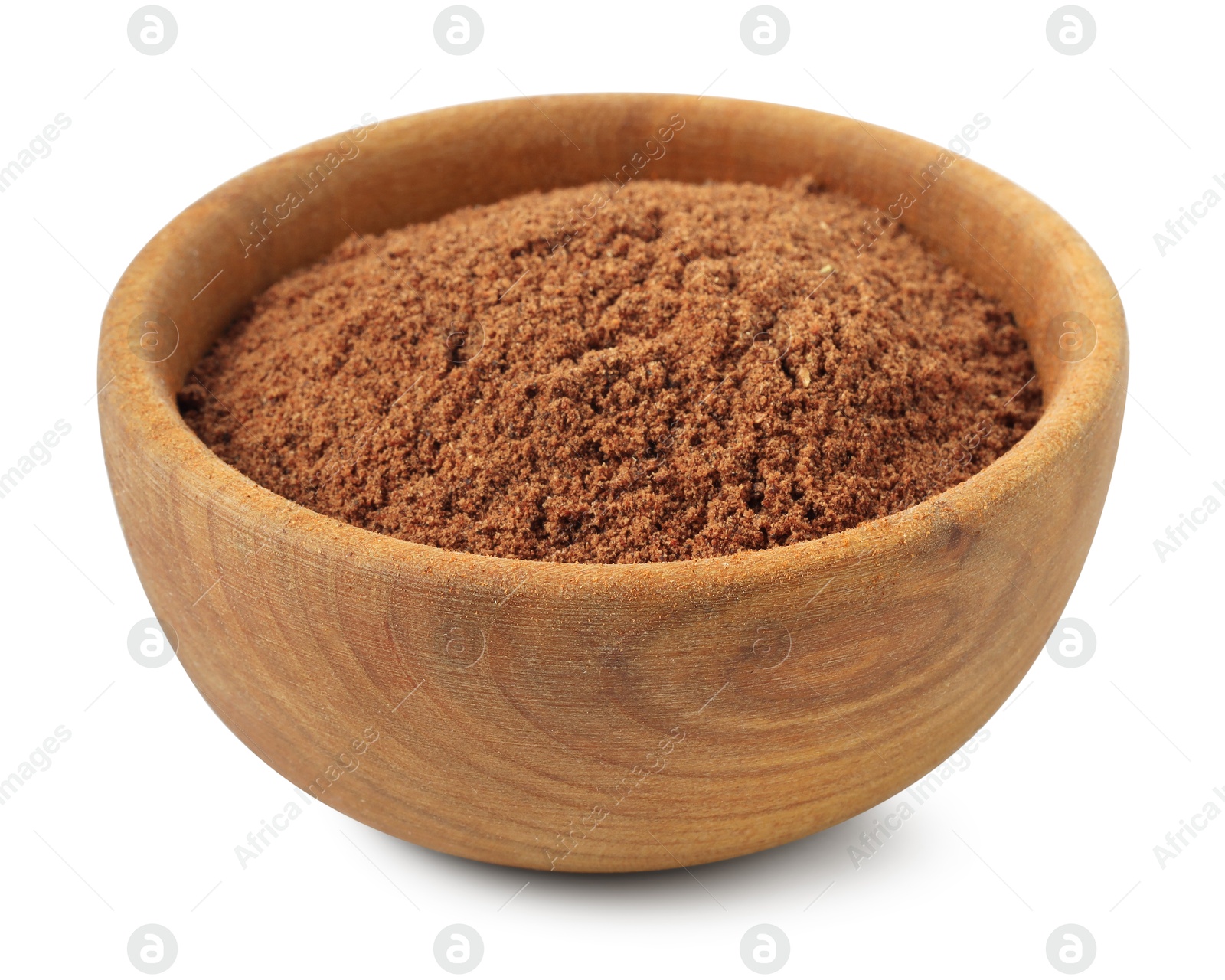 Nutmeg powder in bowl isolated on white Photo of Nutmeg powder in bowl isolated on white