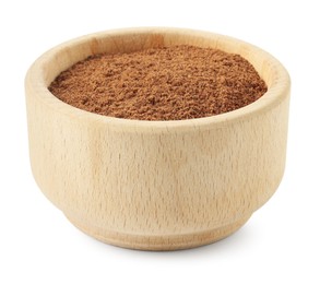 Photo of Nutmeg powder in bowl isolated on white