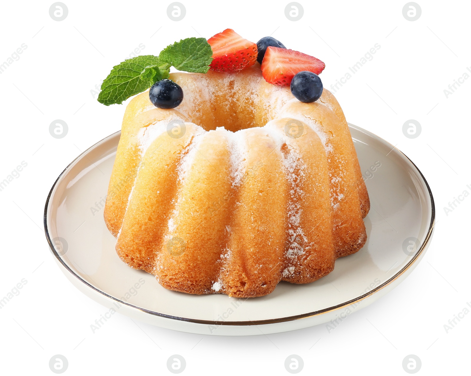 Tasty Bundt cake with powdered sugar and berries isolated on white Photo of Tasty Bundt cake with powdered sugar and berries isolated on white