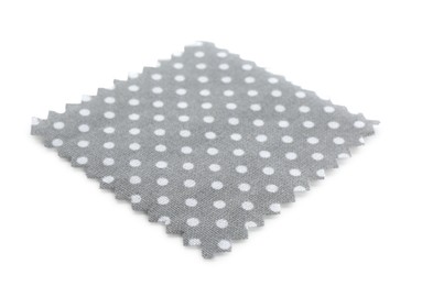 Photo of Sample of grey fabric with polka dot isolated on white
