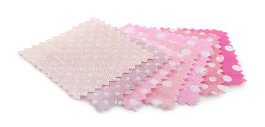 Photo of Samples of fabrics with polka dot pattern isolated on white