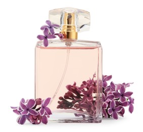 Photo of Bottle of luxury perfume and lilac flowers isolated on white