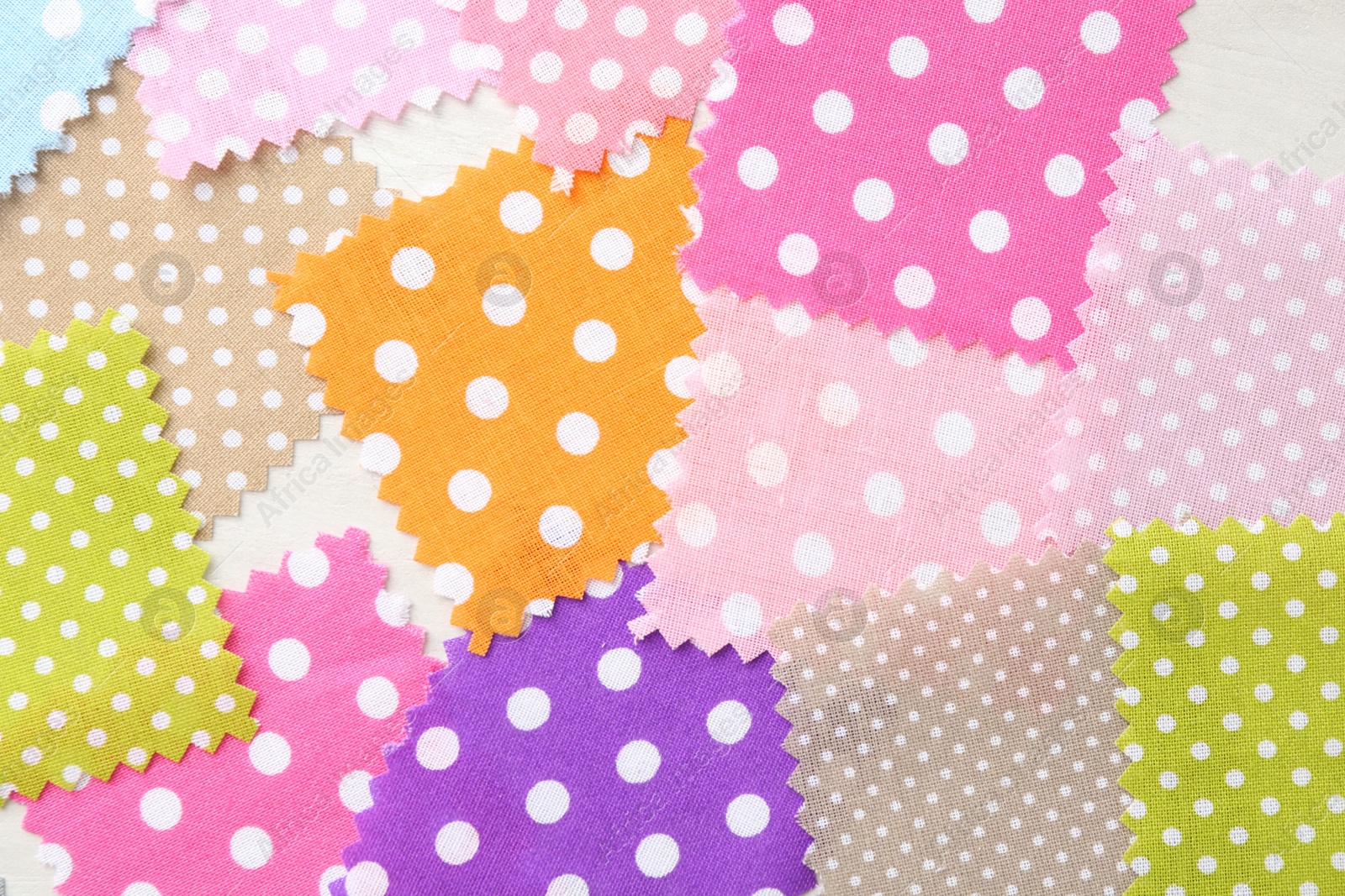 Samples of different fabrics on white wooden table, flat lay Photo of Samples of different fabrics on white wooden table, flat lay