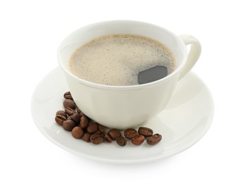 Photo of Aromatic coffee in cup and beans isolated on white