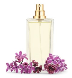 Photo of Bottle of luxury perfume and lilac flowers isolated on white