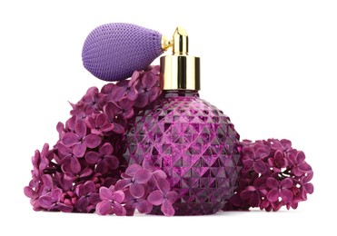 Photo of Bottle of luxury perfume and lilac flowers isolated on white