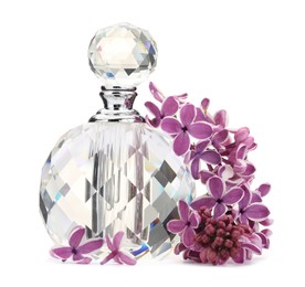 Photo of Bottle of luxury perfume and lilac flowers isolated on white
