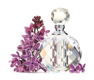 Photo of Bottle of luxury perfume and lilac flowers isolated on white