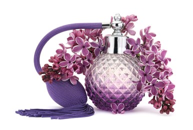 Photo of Bottle of luxury perfume and lilac flowers isolated on white
