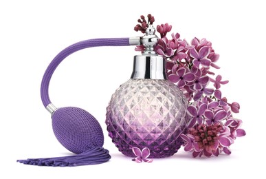 Photo of Bottle of luxury perfume and lilac flowers isolated on white