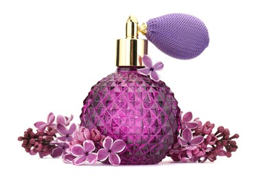 Photo of Bottle of luxury perfume and lilac flowers isolated on white